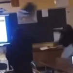 high school teacher knocked unconscious after female student hurls metal chair at her head in flint michigan.jpg